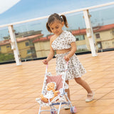 Set gioco passeggino+vestiti bambolotto